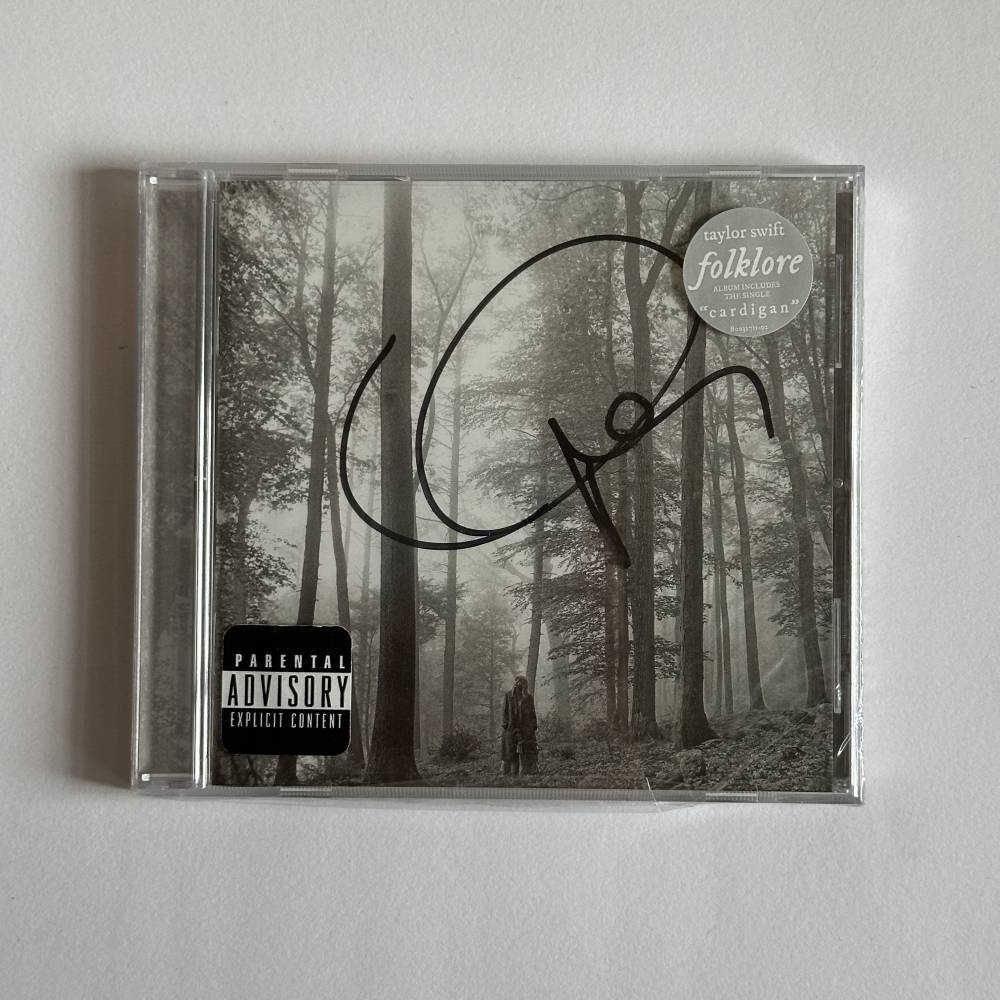 TAYLOR SWIFT SIGNED 'FOLKLORE' ALBUM
